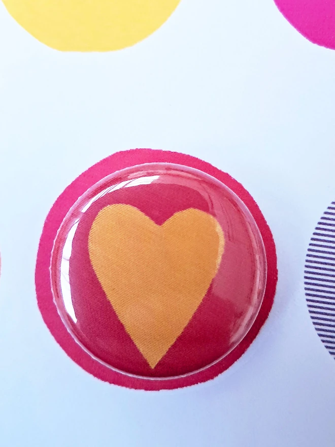 Badge detail of the heart pin badge