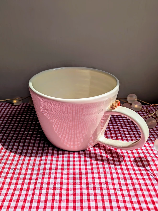 robin couple mug with a tiny pair of robin red breast birds on the cup handle and small bird prints on the white cup