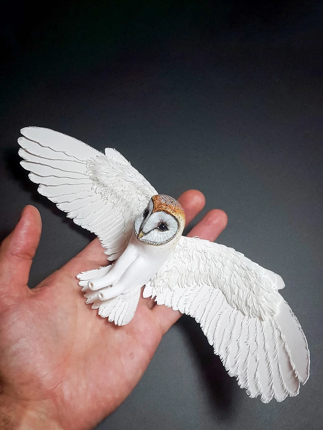 Paper Barn Owl sculpture in artists hand