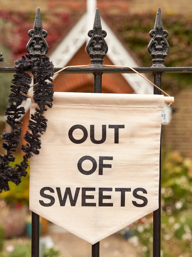 Trick or treat out of sweets reversible Halloween banner