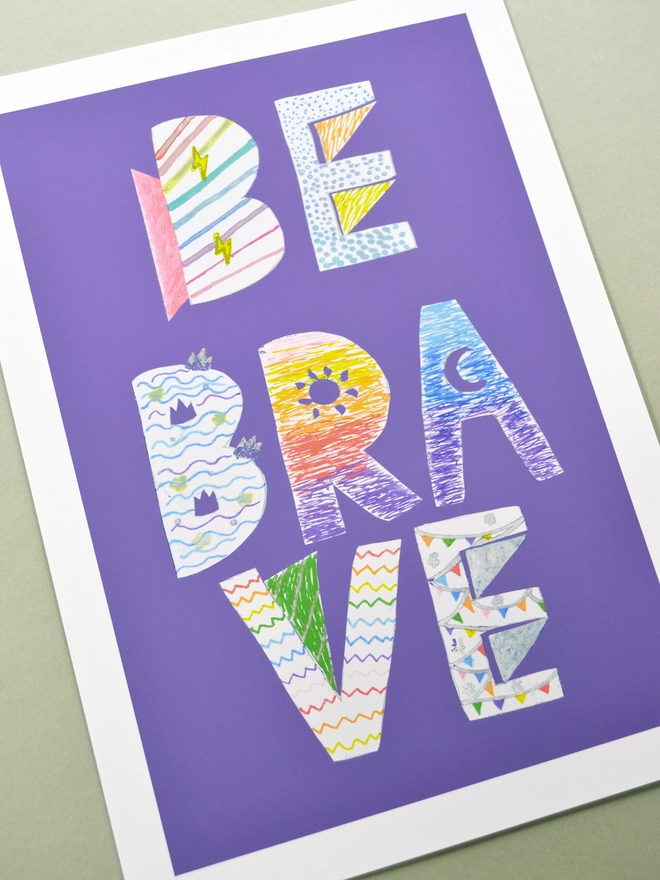 Close up of an art print saying 'Be brave'