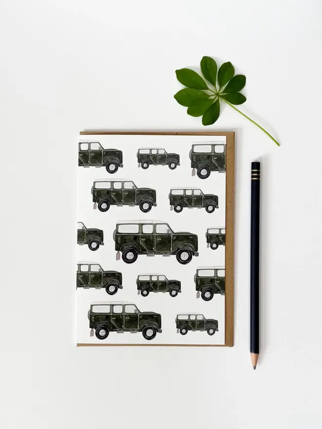 land rover defender illustrated card. card photographed against plain white background.