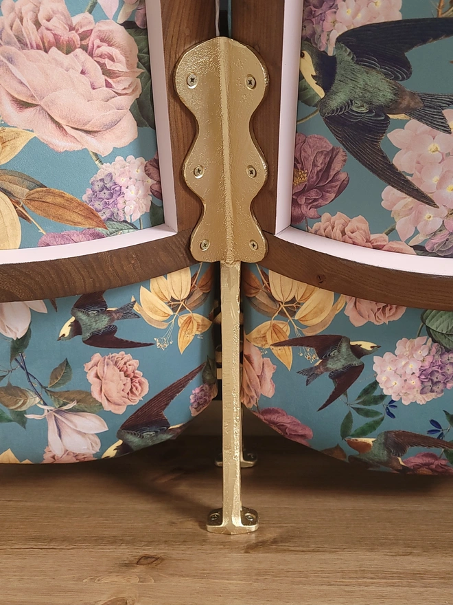 Vintage cinema seats in Swallows and Blooms with gold legs, back details