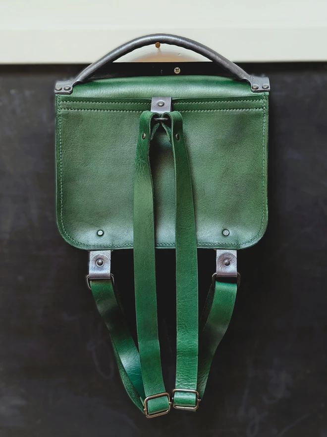 Green Robot backpack, back view.