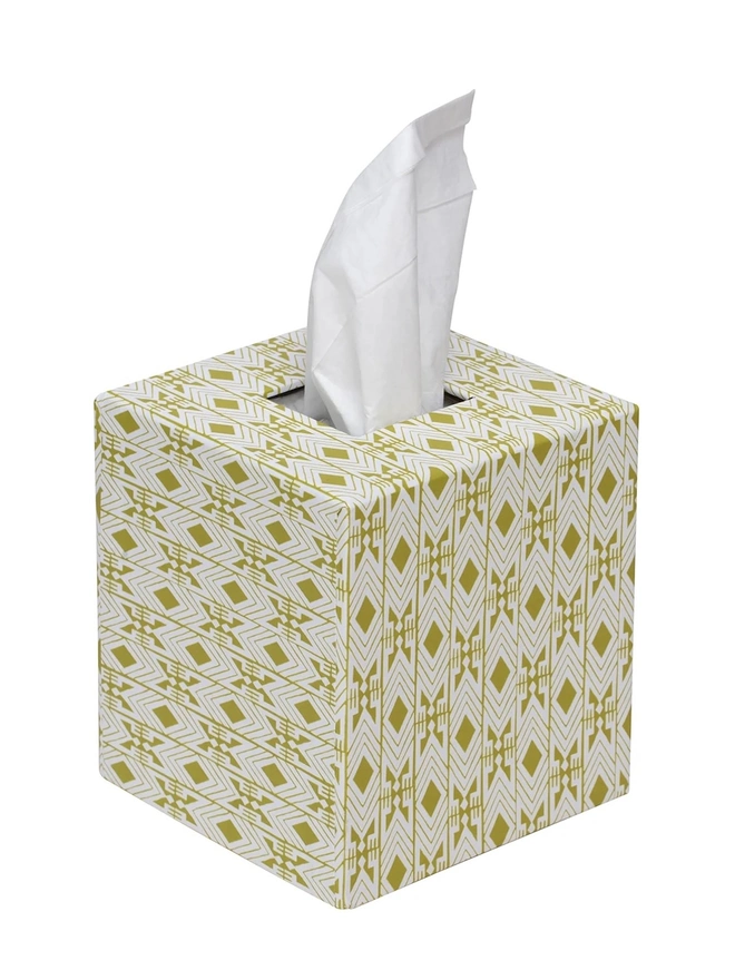 Tijan Tissue Box Cover, a colourful and patterned tissue box sitting on a white surface against a plain backdrop. 