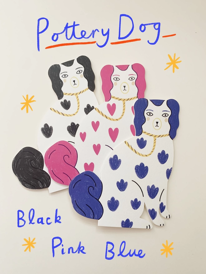 Ceramic dog shaped card with a gold bell By kitty kenda papergoods 