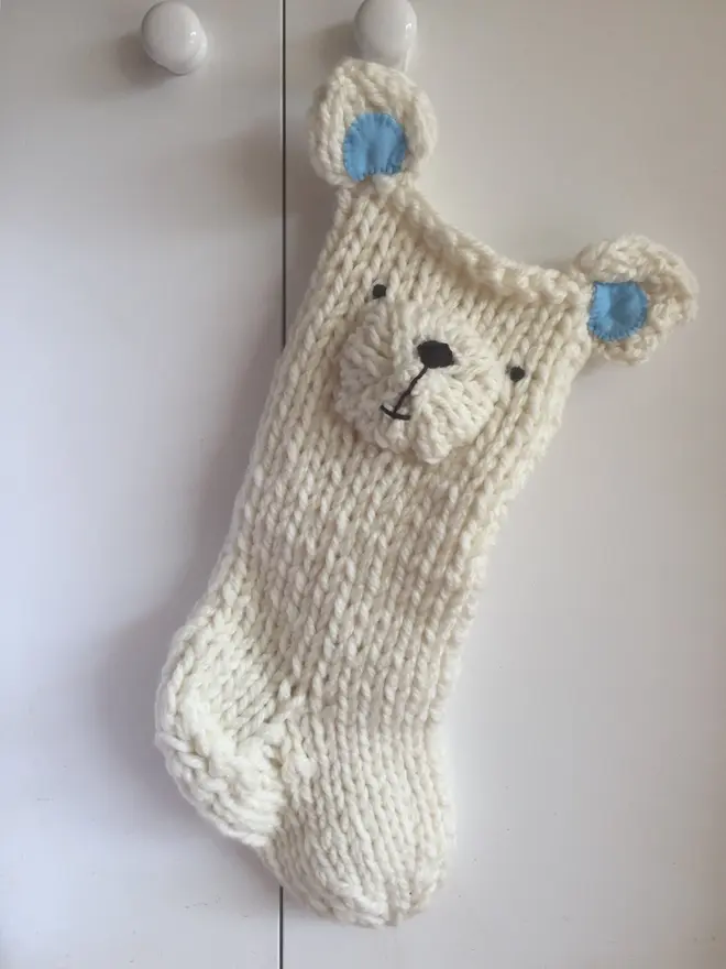 Hand Knitted Polar Bear Stocking with Blue Ears.