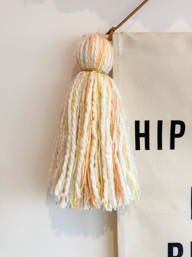 Multicolour tassel on birthday banner