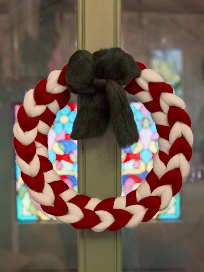 Knitted Christmas wool candy cane wreath