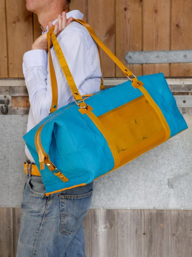Rescued leather and fire-hose Weekend bag 