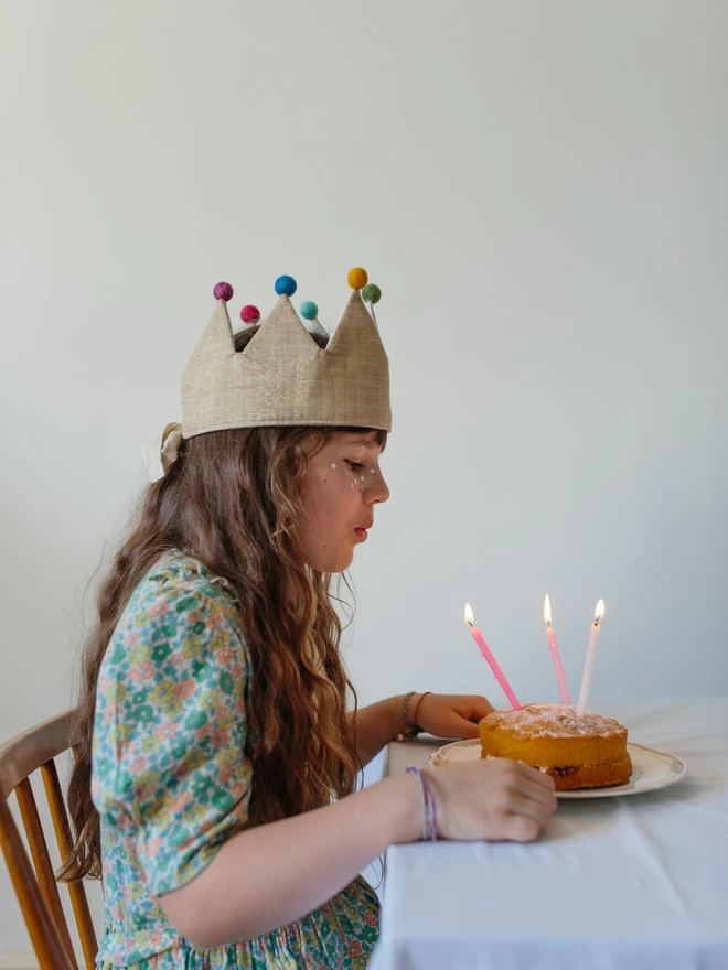 Girl with Birthday cake and gold crown