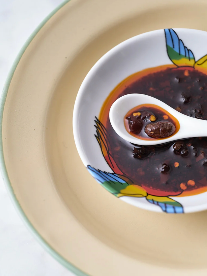 Chilli Vinegar. A sample of sauce in a dish.