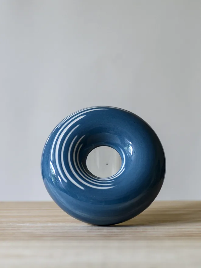 Avocado Planter White & Blue Handmade porcelain avocado planter with carved blue pattern, designed to hold an avocado seed for sprouting
