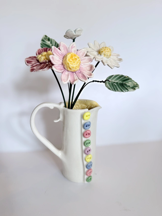 Pastel coloured porcelain flowers 