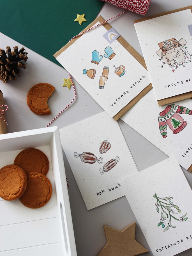 'An Eco-Friendly Christmas' Punny Card 5 Pack splayed out on table