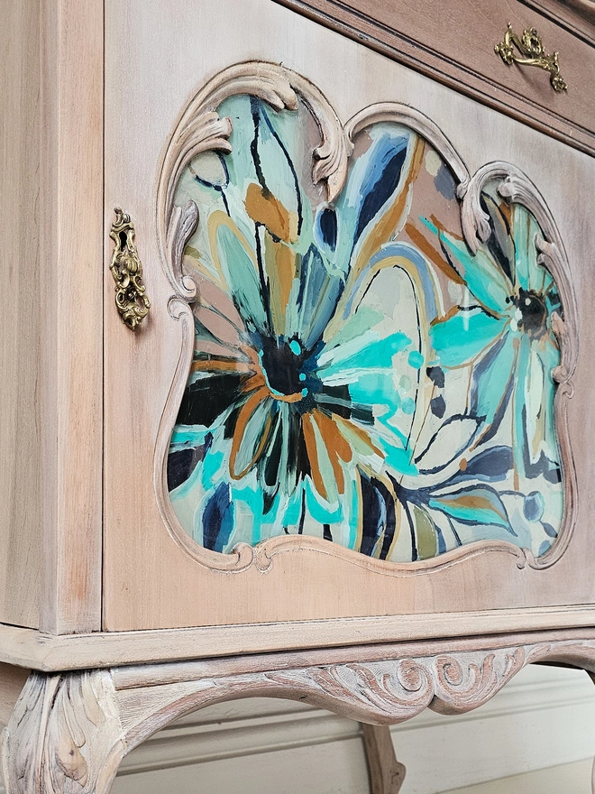 Bespoke floral painted cabinet by Chloe Kempster