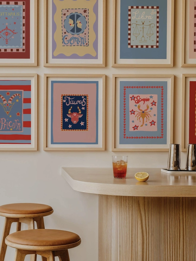 Gallery wall of star sign framed prints 
