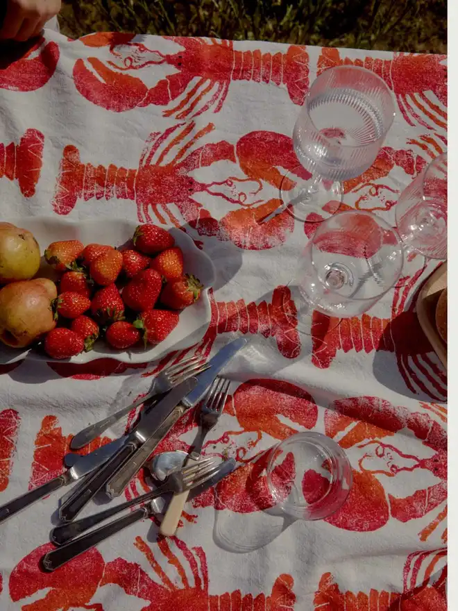 Lobster tablecloth with strawberry plate