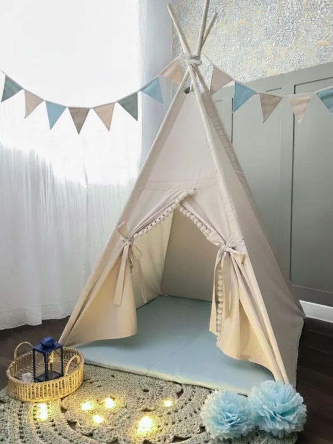 Personalised Natural & Blue Kids’ Teepee. A canvas teepee with blue accents.