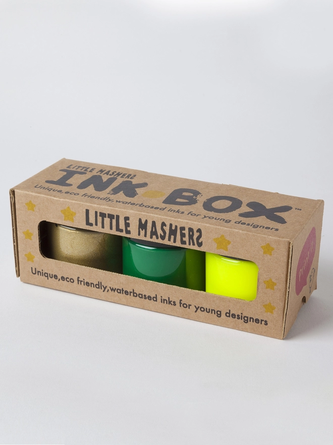Box of fabric inks showing gold green and neon yellow colours