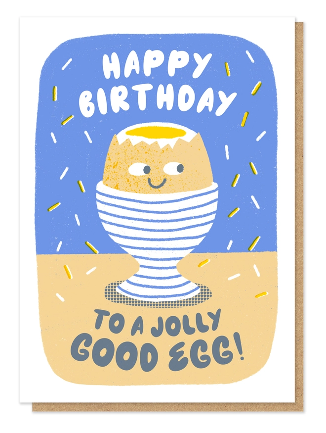 Letterpress card showing a hard boiled egg with a smiley face sat in a striped eggcup. The wording says "Happy Birthday to a jolly good egg!"