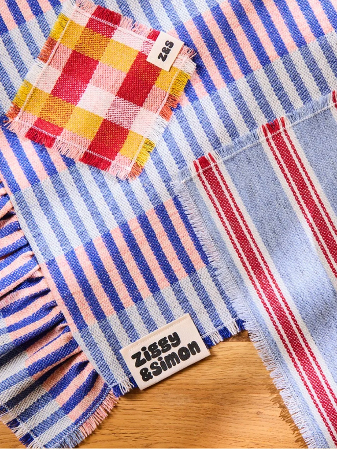 Blueberry Pie Runner. Runner in Blueberry Pie, placemat in Blue Raspberry, and a coaster in Rhubarb and Custard
