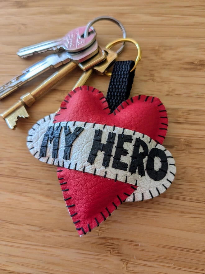 Red tattoo style leatherette heart keyring with the words My Hero