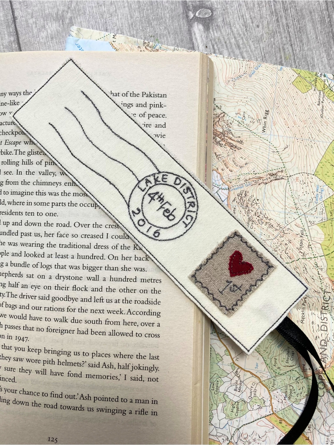Embroidered postmark bookmark with heart stamp