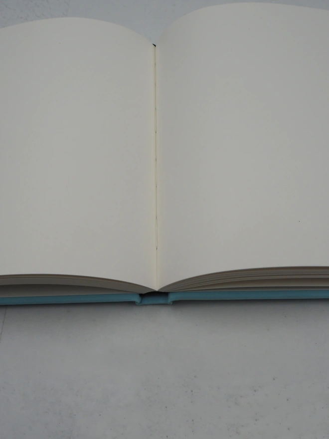 personalised wedding guestbook inner pages, lay flat and section sewn