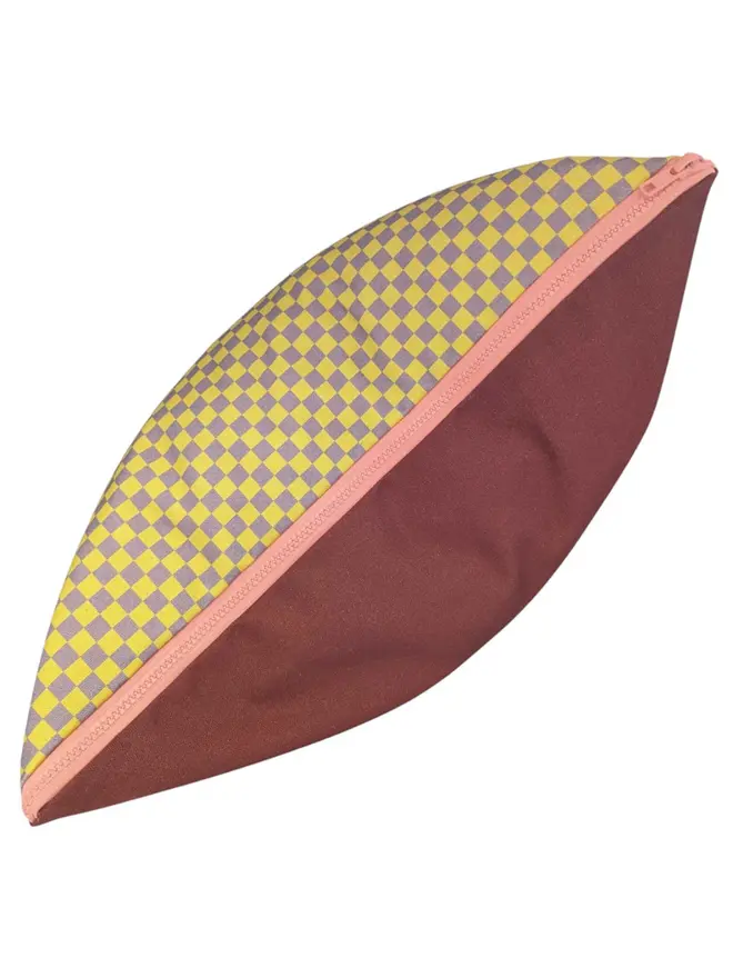 Cotton Print Patterned Cushion, a cushion sitting on a white surface. 