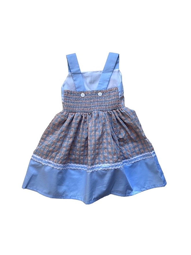 Back of a sundress with blue checked fabric, plain blue fabric and rikrak detail