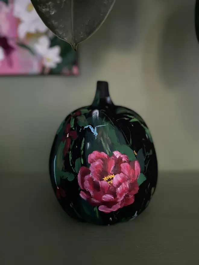 hand painted ceramic floral halloween pumpkin decoration black background with deep red peonies, Erysimum cheiri ‘Blood Red’ flowers