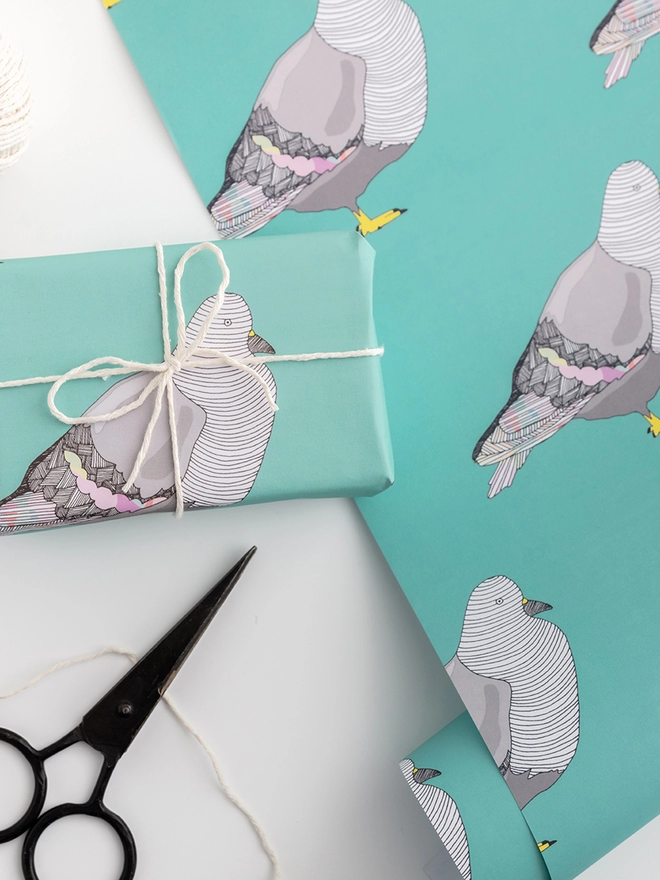 green giftwrap featuring pigeons 