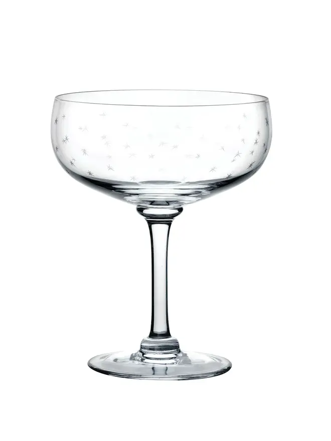engraved stars crystal cocktail glass. two cocktail glasses patterned with small stars.