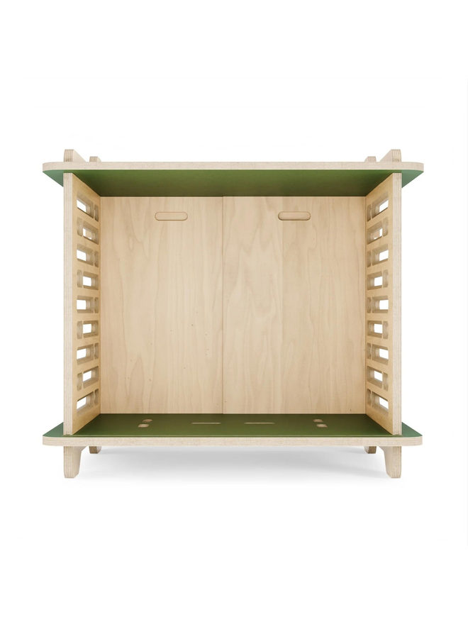 wooden dog crate interior with green top 