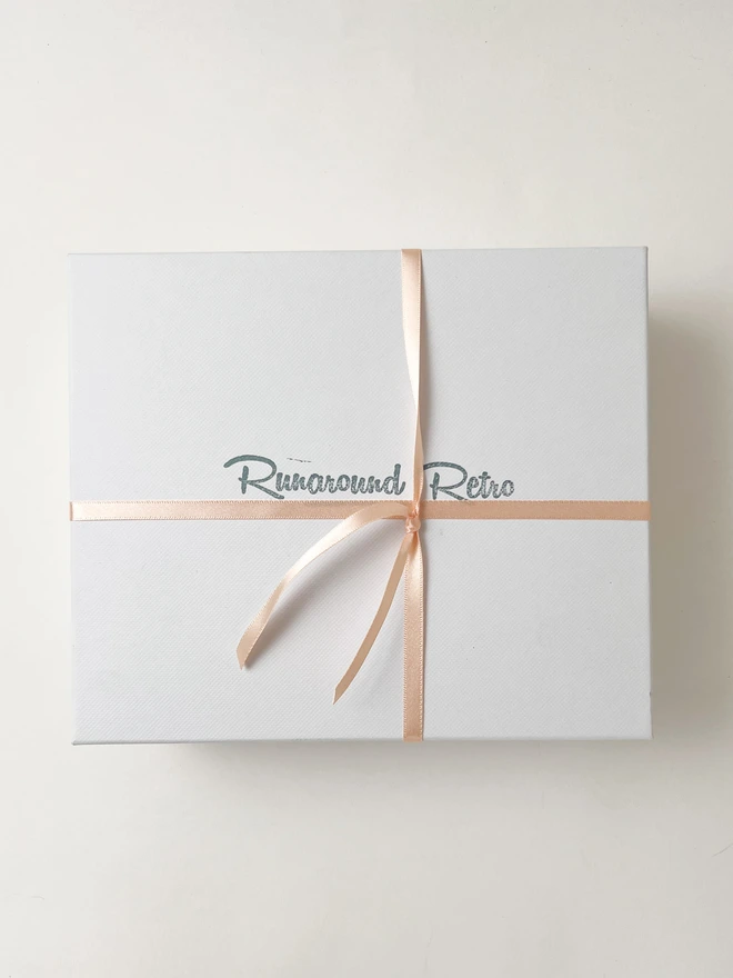 pale pink ribbon gift box