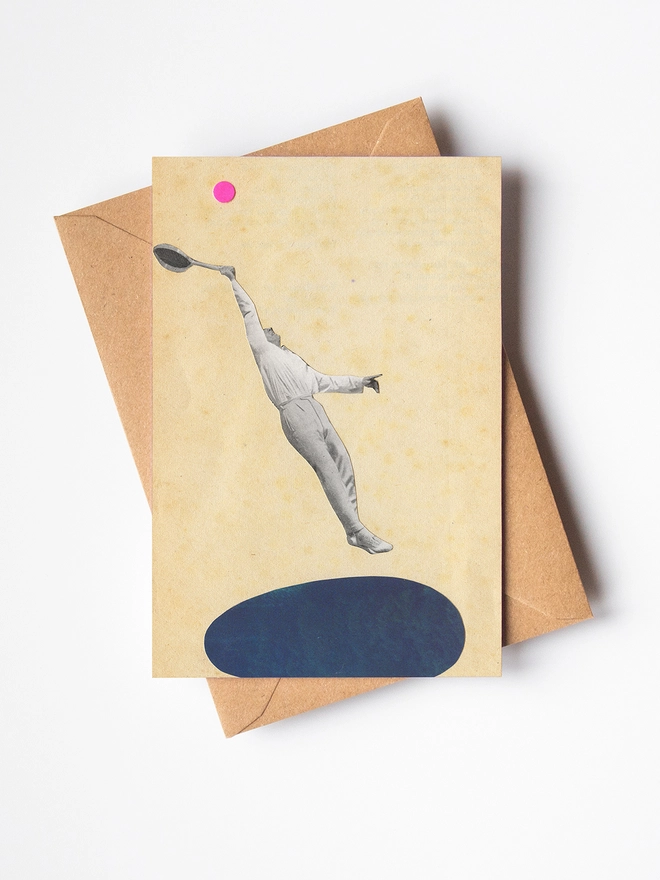 A greeting card depicting a male tennis player hitting a ball. 