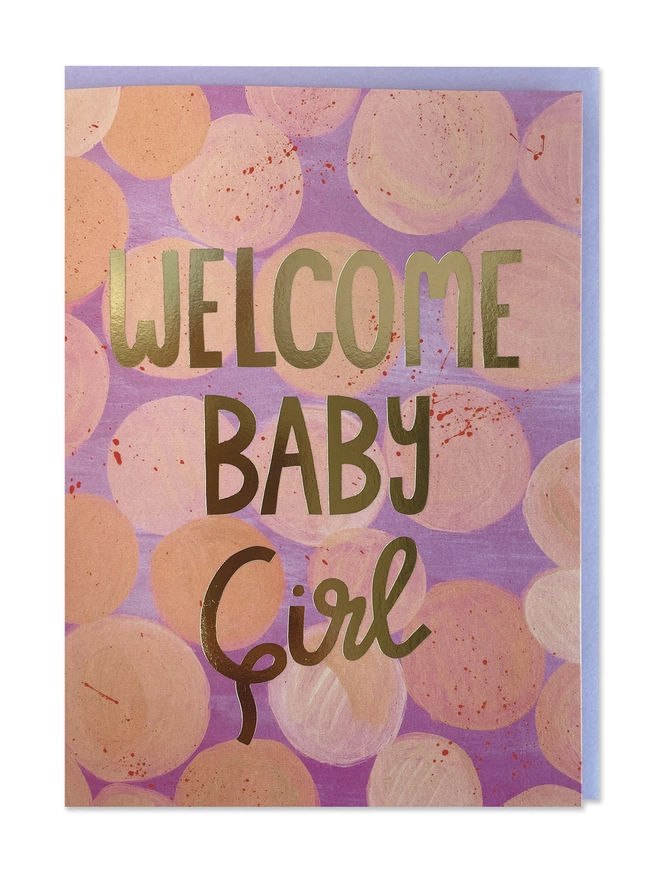 A painterly new baby card with abstract design in vibrant brush strokes peaches, pinks and purples. Finished with a gold foil ‘Welcome Baby Girl’ message