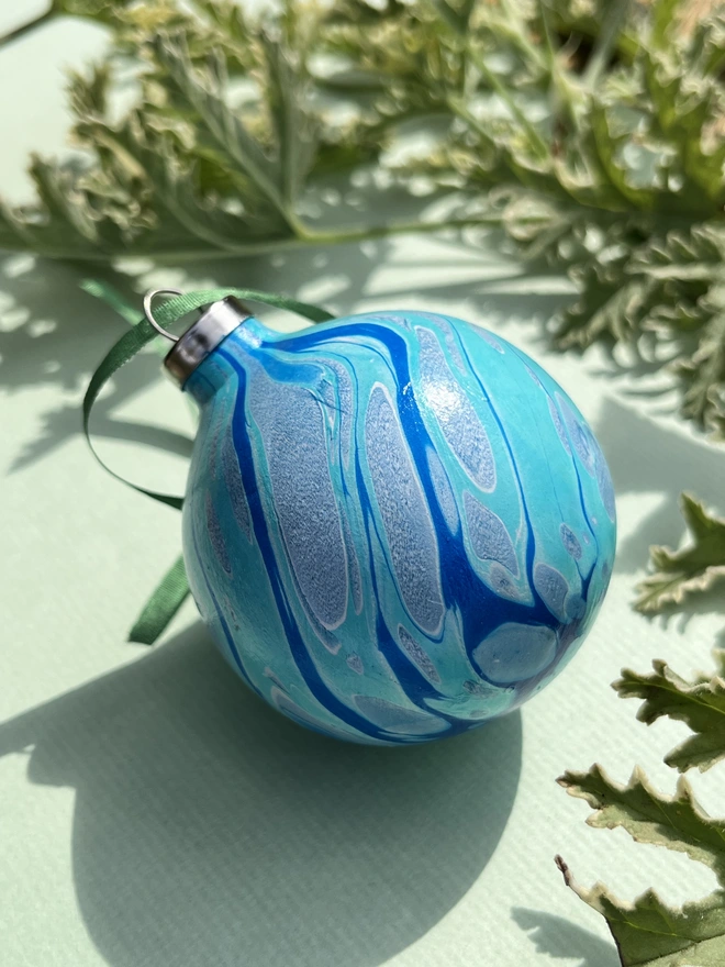 Hand-marbled round ceramic Christmas bauble