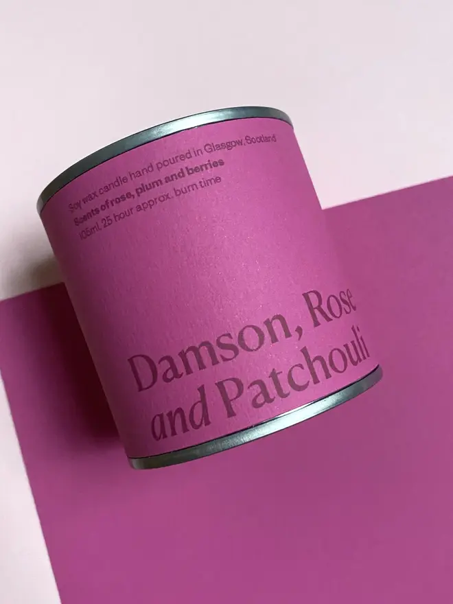 Valentine's Day Soy Wax Candle Tin, against a pink background. 