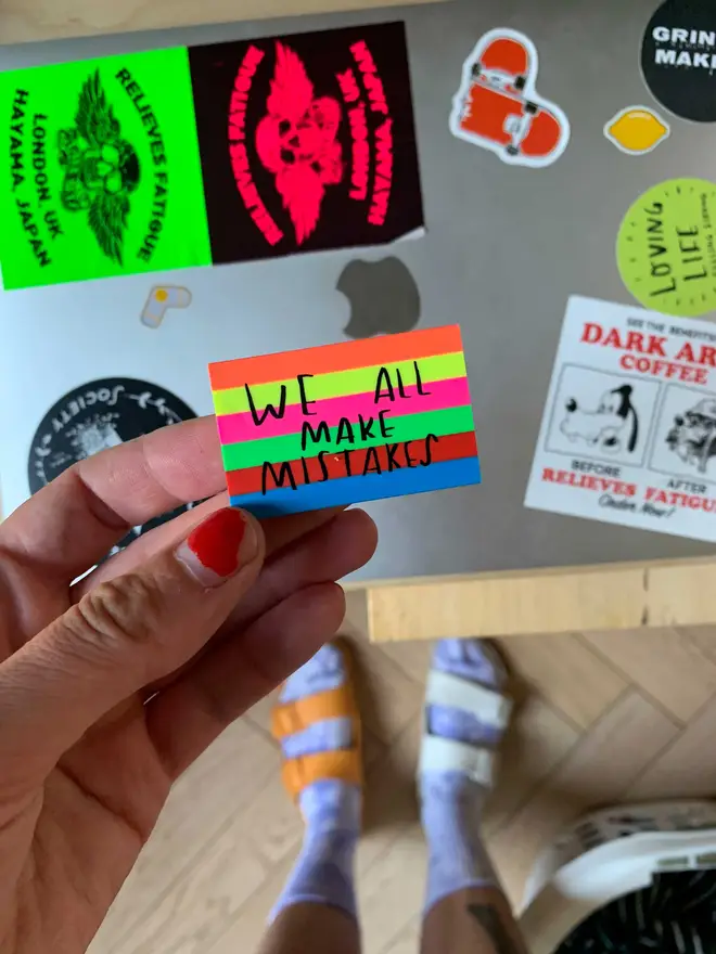 Eraser with multicoloured stripes