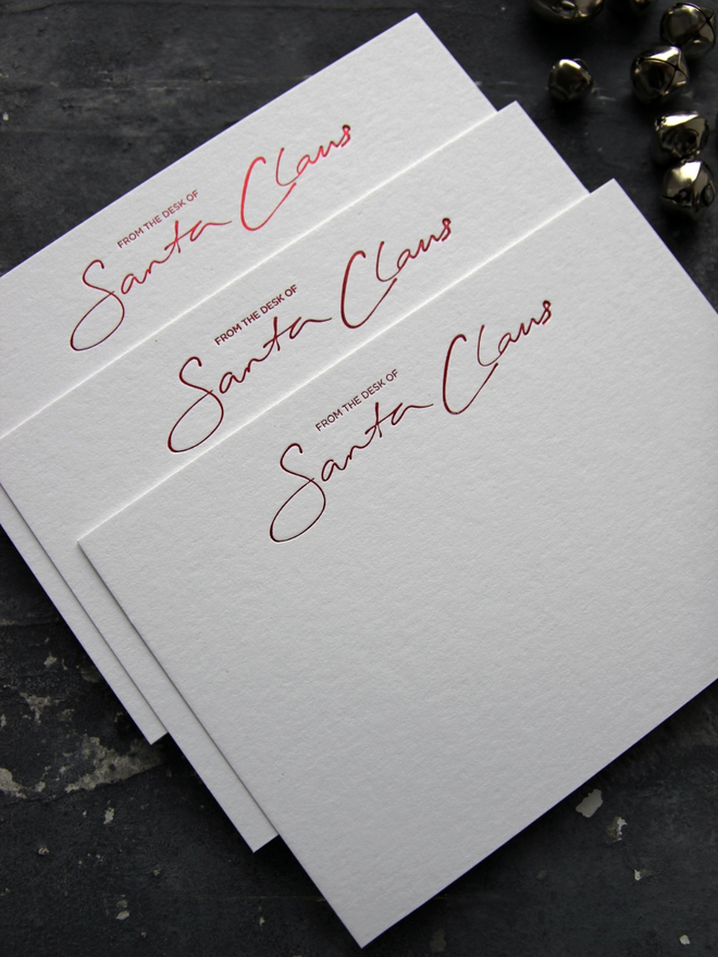 From The Desk Of Santa Claus notecards hand foiled in red text with an envelope that says North Pole Mail