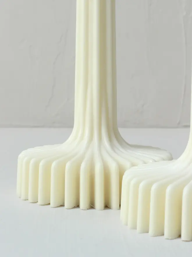 geometric aromatherapy soy candles (pack of 2). image zoomed in on candle bases.