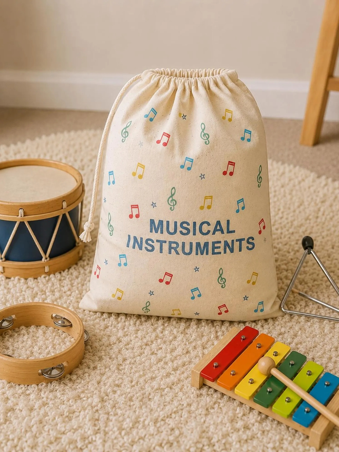 personalised musical bag. a drawstring bag with printed music symbols and a personalised name.