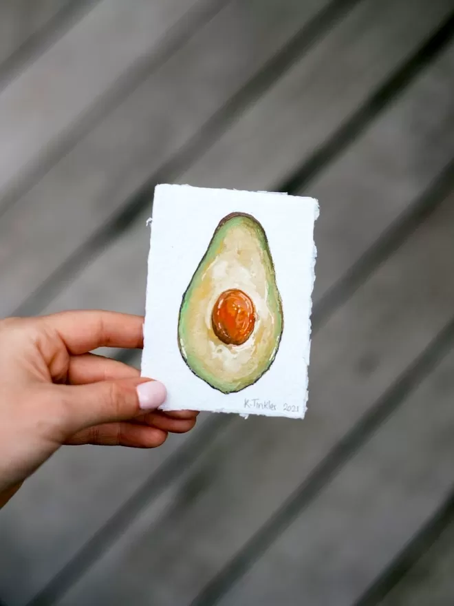 Katie Tinkler Illustration of an avocado.