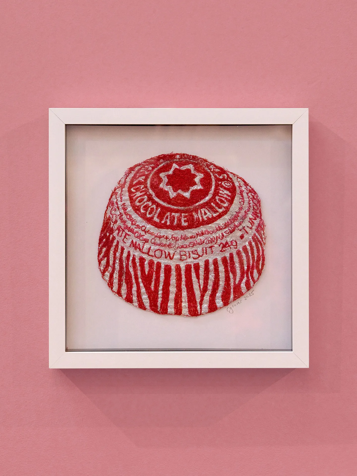 Tunnocks Teacake Embroidery Wall Art with a White Frame and Pink Background