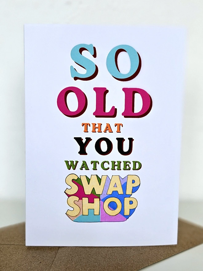 A nostalgic card that says So old that you watched Swap Shop in colourful retro style fonts on a white background. 