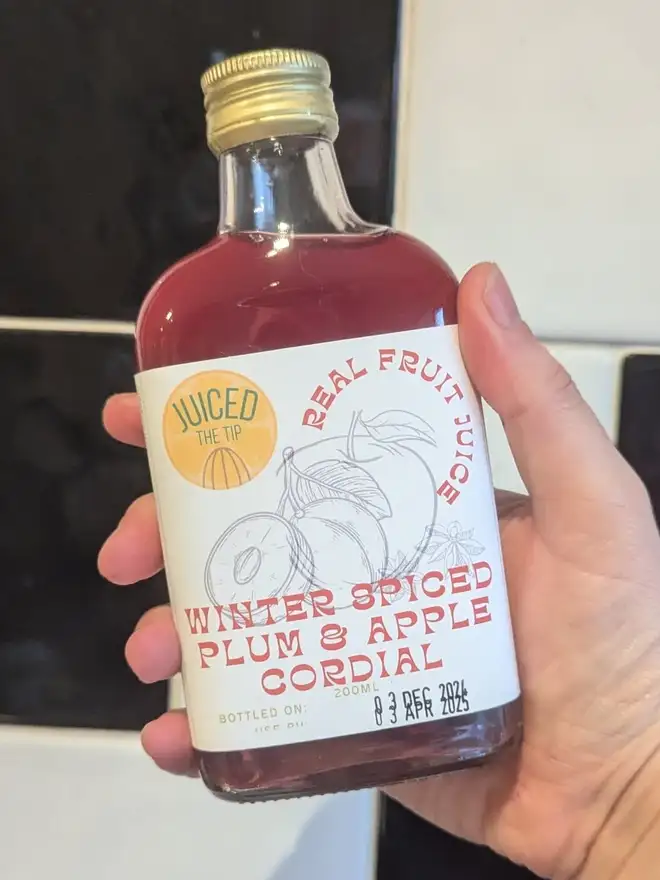 spiced plum apple christmas cordial bottle