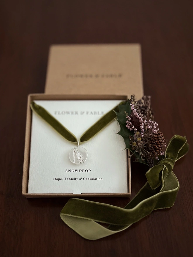 Sterling Silver Snowdrop Coin Charm with ribbon and flower posy