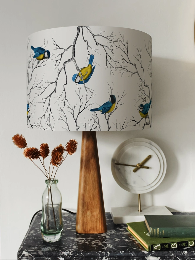 Blue Tit lampshade featuring a playful pattern of colourful British garden birds.